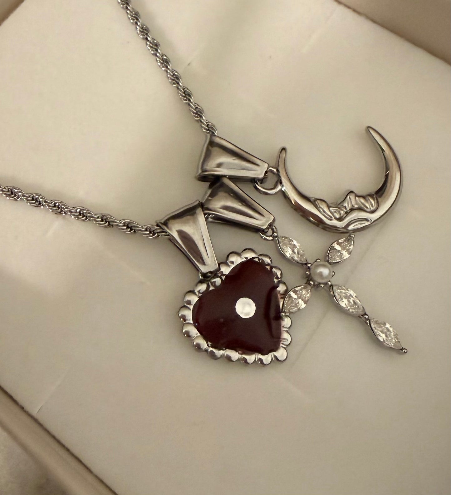 Delia Cross Silver