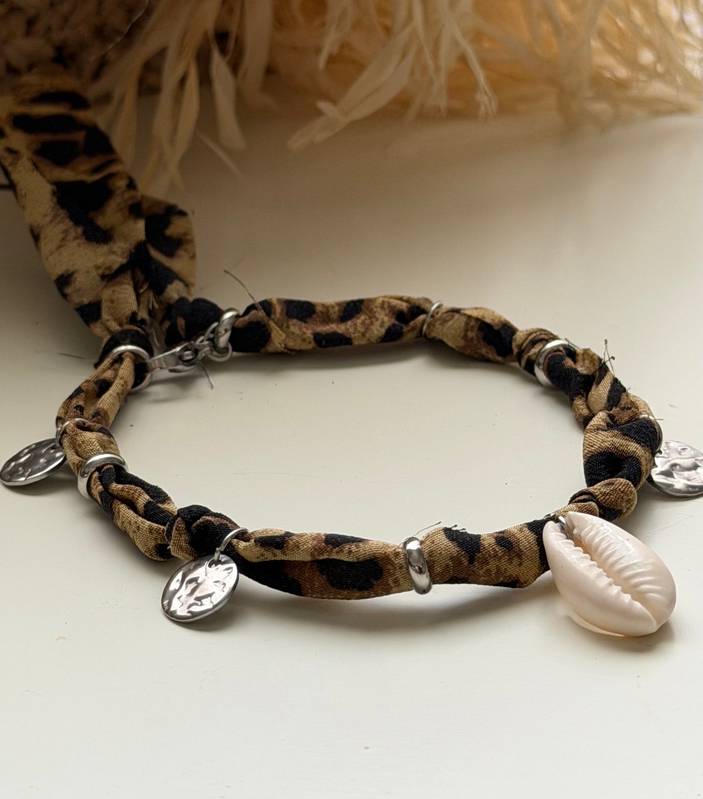 Cavigliera Maculata 🐆🐚