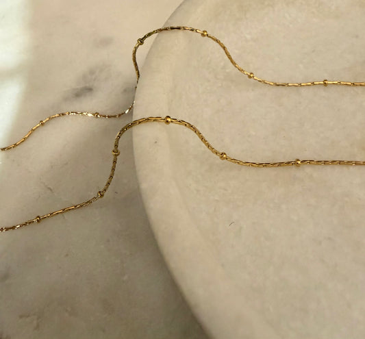 Collana semirigida sottile microsfere