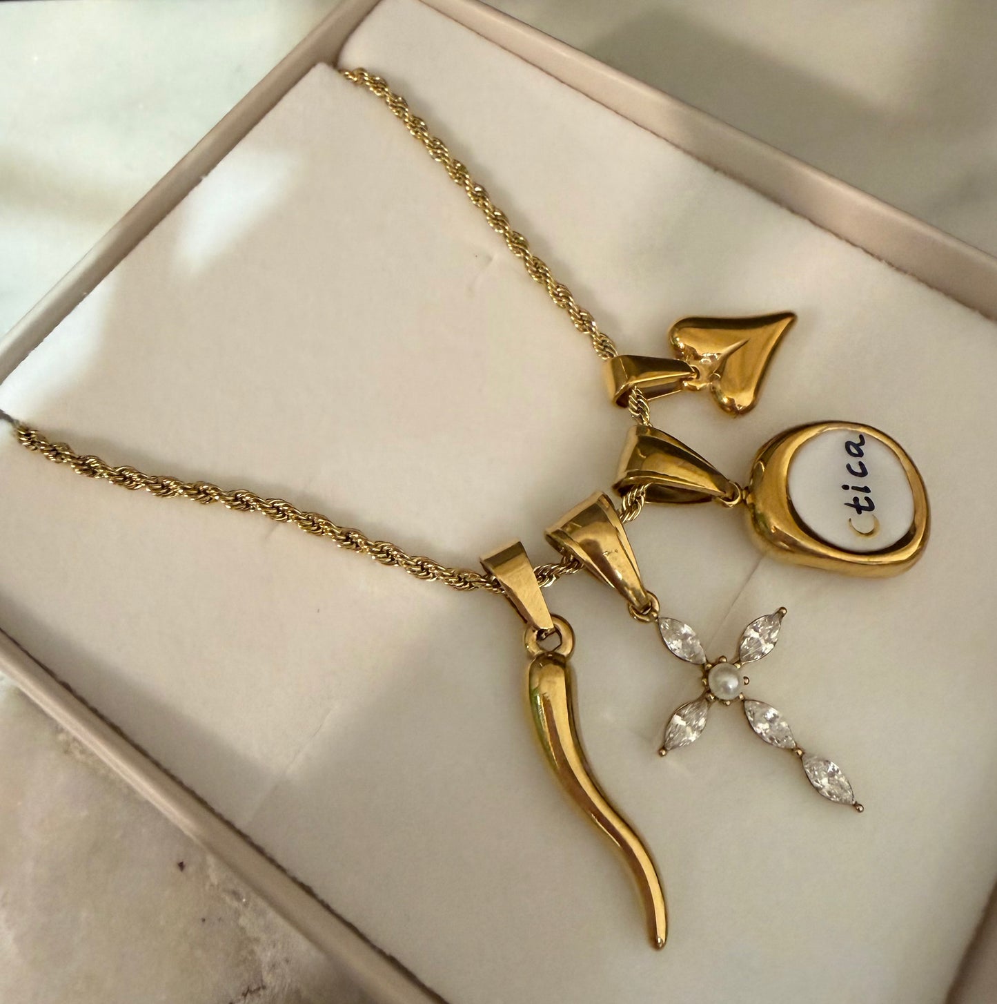 Delia Cross Gold